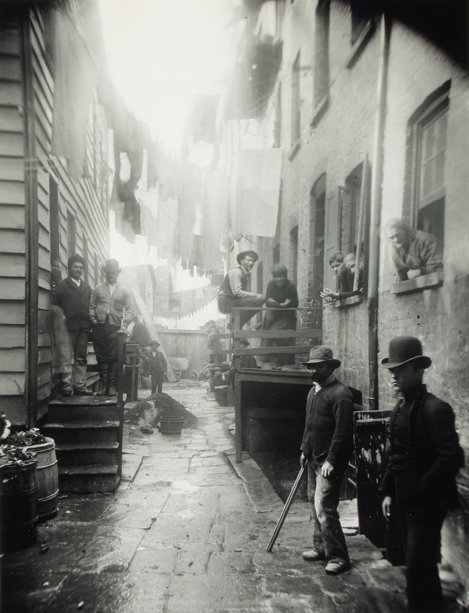 https://fiveable.me/_next/image?q=75&url=https%3A%2F%2Fstorage.googleapis.com%2Fstatic.prod.fiveable.me%2Fsearch-images%252F%2522Early_urban_documentarians_Jacob_Riis_John_Thomson_photography_New_York_City_London_street_life%2522-Bandit%27s_Roost_by_Jacob_Riis.jpeg.jpg&w=3840